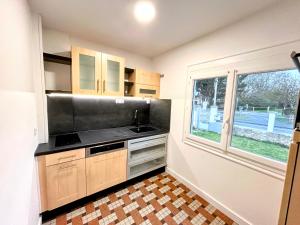 Una cocina o cocineta en Maison proche Mer 14 fotos más