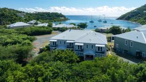 an aerial view of houses and a harbor at Southern Star Villa Kayaks SUPS Steps to Beach in Monte