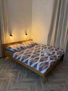 Postel nebo postele na pokoji v ubytování KEY Accommodation Vlhka