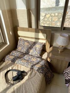 Postel nebo postele na pokoji v ubytování panorama tal elroman chalet + 5 fotografií