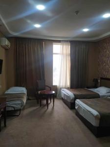 Ένα ή περισσότερα κρεβάτια σε δωμάτιο στο Hotel white balcony