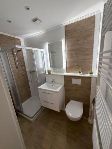 Et badeværelse på Ferienwohnung Eider