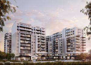 two tall white apartment buildings in a city at Sofia TS apartment in Craiova