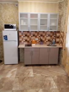 Η κουζίνα ή μικρή κουζίνα στο Студия в ЖК Воронцовский, рядом McDonald's