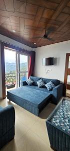 Ένα ή περισσότερα κρεβάτια σε δωμάτιο στο Opal Villas