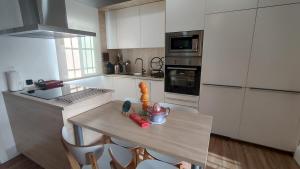 Η κουζίνα ή μικρή κουζίνα στο Apartamento EL REAL - Espartinas - SEVILLA +61 φωτογραφίες