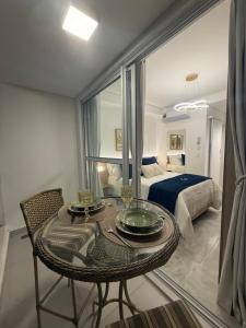 Ένα ή περισσότερα κρεβάτια σε δωμάτιο στο Essenza Manhattan 1 Blue Studio