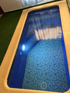 una vista aérea de una piscina en Wekati Aldeamento Turístico, en Chaunlundo 11 fotos más