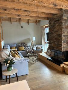 Posezení v ubytování Eth Estel de Salardú--Casa con vistas de ensueño-Fibra Optica,5TV