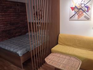 Ένα ή περισσότερα κρεβάτια σε δωμάτιο στο Centar Crnjanski 2 +25 φωτογραφίες