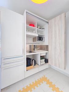 Nhà bếp/bếp nhỏ tại Eden 's paradise