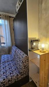 Una cama o camas en una habitación de Studio entier