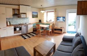 A kitchen or kitchenette at Appartementhaus LAKE VIEW by All in One Apartments