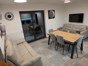 Μια τηλεόραση ή/και κέντρο ψυχαγωγίας στο Apartma JOŠT