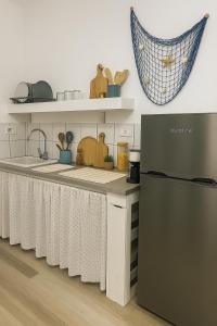 Kuchyň nebo kuchyňský kout v ubytování La Finestra Sul Mare