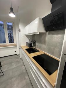 Η κουζίνα ή μικρή κουζίνα στο Iron Loft apartment +5 φωτογραφίες