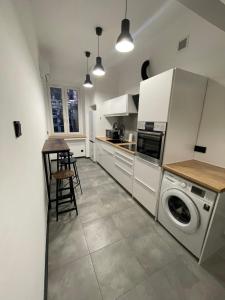 Η κουζίνα ή μικρή κουζίνα στο Iron Loft apartment