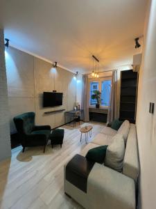 Μια τηλεόραση ή/και κέντρο ψυχαγωγίας στο Iron Loft apartment