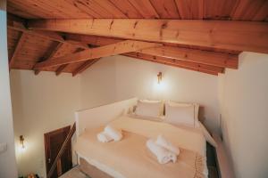 Ένα ή περισσότερα κρεβάτια σε δωμάτιο στο Loft Escape