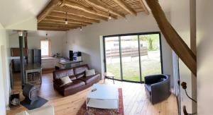 TV a/nebo společenská místnost v ubytování Domaine d'Empié