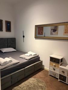 Кровать или кровати в номере IN Apartman, Župa Kopaonik