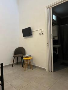 TV a/nebo společenská místnost v ubytování Lemonia