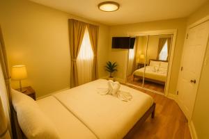 Ένα ή περισσότερα κρεβάτια σε δωμάτιο στο 2 BR Apt|15 Min to NYC|Book Today