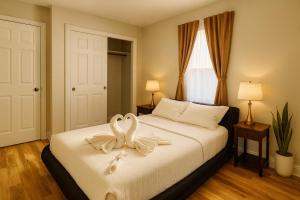 Ένα ή περισσότερα κρεβάτια σε δωμάτιο στο 2 BR Apt|15 Min to NYC|Book Today