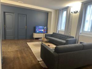 Posezení v ubytování Le Charlet, Entre Marais et Coeur de ville