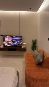 Et tv og/eller underholdning på Deluxe Studio Self Check In