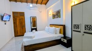 Ένα ή περισσότερα κρεβάτια σε δωμάτιο στο Grand Toscana +27 φωτογραφίες