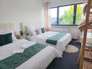 Ένα ή περισσότερα κρεβάτια σε δωμάτιο στο Große Wohnung mit Balkon nahe München