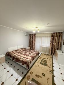 Giường trong phòng chung tại гостиница Азия