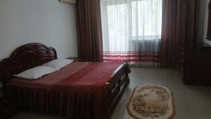 Giường trong phòng chung tại гостиница Азия