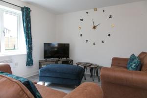 Et tv og/eller underholdning på Holiday Home with Hot Tub