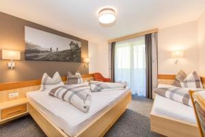 Postel nebo postele na pokoji v ubytování Appartementhaus Sieglinde