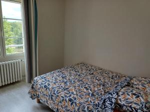 Postel nebo postele na pokoji v ubytování Le Mas de Vinel