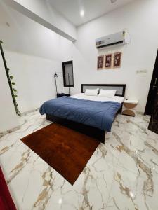 Postel nebo postele na pokoji v ubytování Ekank Villa