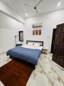 Postel nebo postele na pokoji v ubytování Ekank Villa