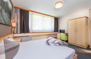 Postel nebo postele na pokoji v ubytování Appartementhaus Sieglinde