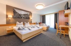 Postel nebo postele na pokoji v ubytování Appartementhaus Sieglinde