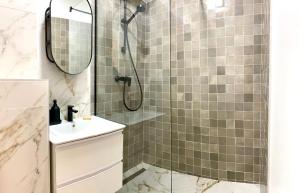 Koupelna v ubytování V25Appartments Cozy + 14 fotografií