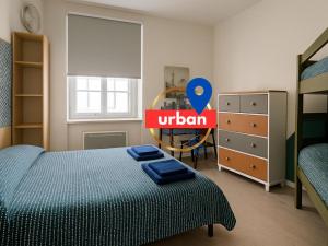 Postel nebo postele na pokoji v ubytování Duplex du Cloître 75m2