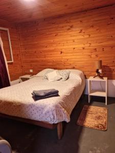 En eller flere senge i et værelse på La Casita de Pichon