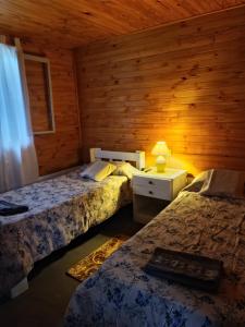 En eller flere senge i et værelse på La Casita de Pichon + 8 billeder