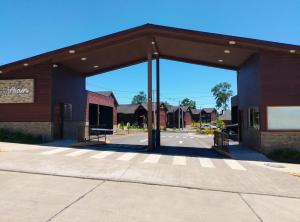 a building with a large open door in a street at Vive Pucón in Pucón