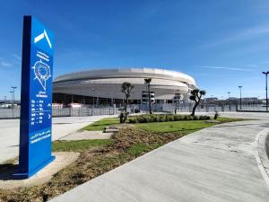 a soccer stadium with a sign in front of it at Brand new apartment in Sport city Tangier in Tangier