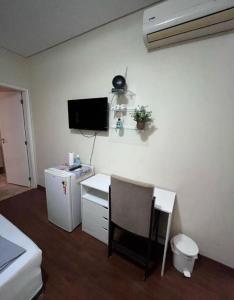 TV a/nebo společenská místnost v ubytování Pousada Vermont