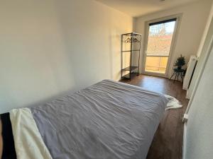 Ένα ή περισσότερα κρεβάτια σε δωμάτιο στο Dresden Altstadt