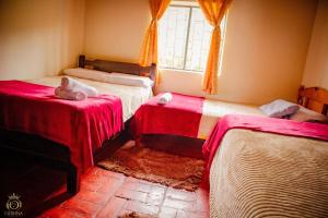 Postel nebo postele na pokoji v ubytování Villa Campestre El Mirador